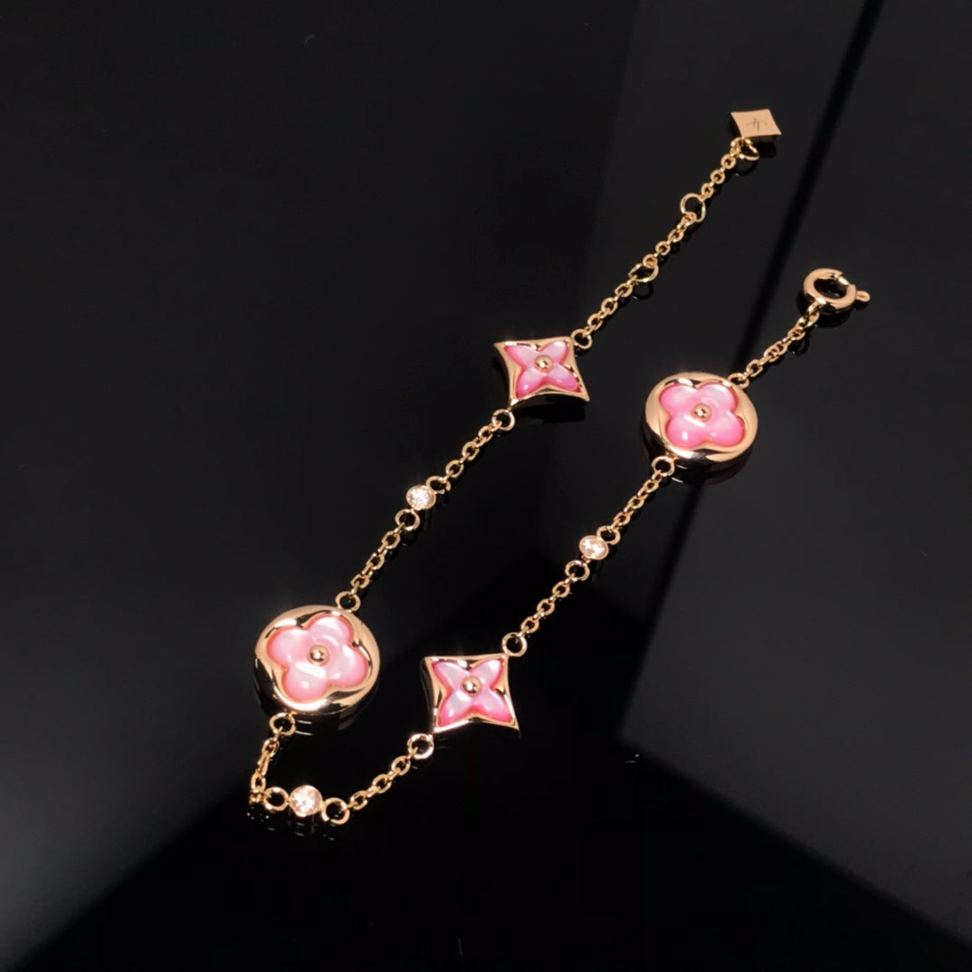 [Elitejewels]STAR AND SUN 4 MOTIF PINK MOP PINK GOLD BRACELET