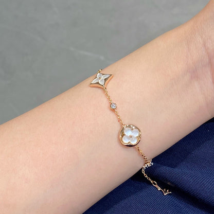 [Elitejewels]STAR AND SUN 4 MOTIF WHITE MOP PINK GOLD BRACELET