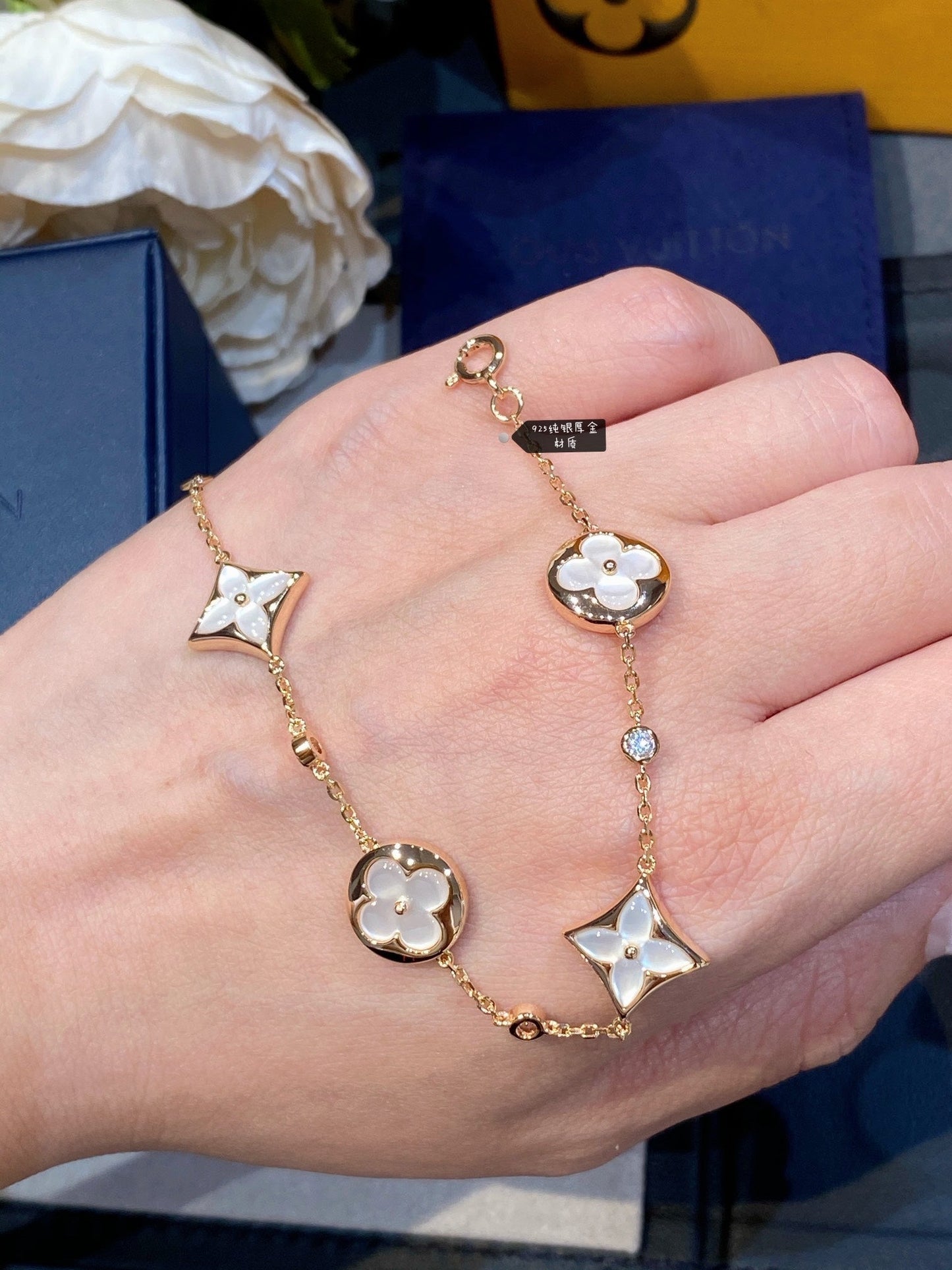 [Elitejewels]STAR AND SUN 4 MOTIF WHITE MOP PINK GOLD BRACELET