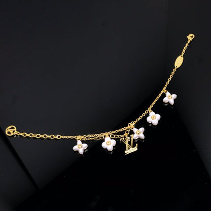 [Elitejewels]LOGO 6 MOTIF STAR AND SUN GOLD BRACELET